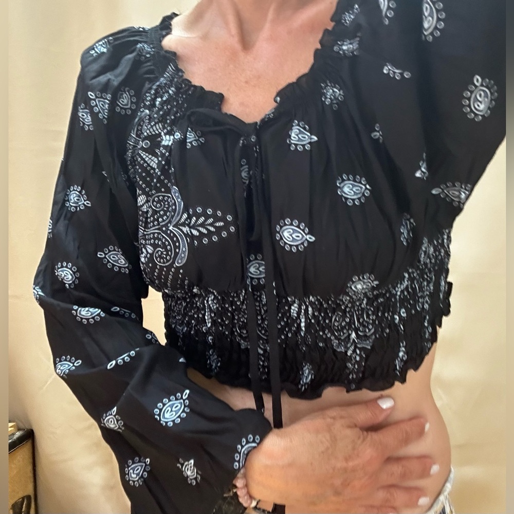 Black paisley crop top peasant blouse with front tie and long bell sleeves. S-M